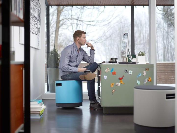 Man sitting on a Buoy chair