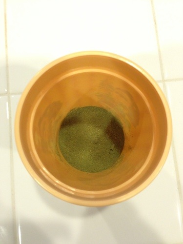 Green Powder in cup Green Powder in cup