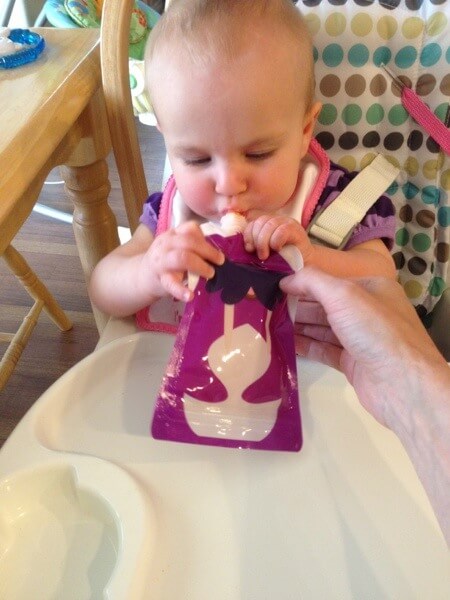 Alex eating from Squooshi pouch Alex eating from squooshi pouch