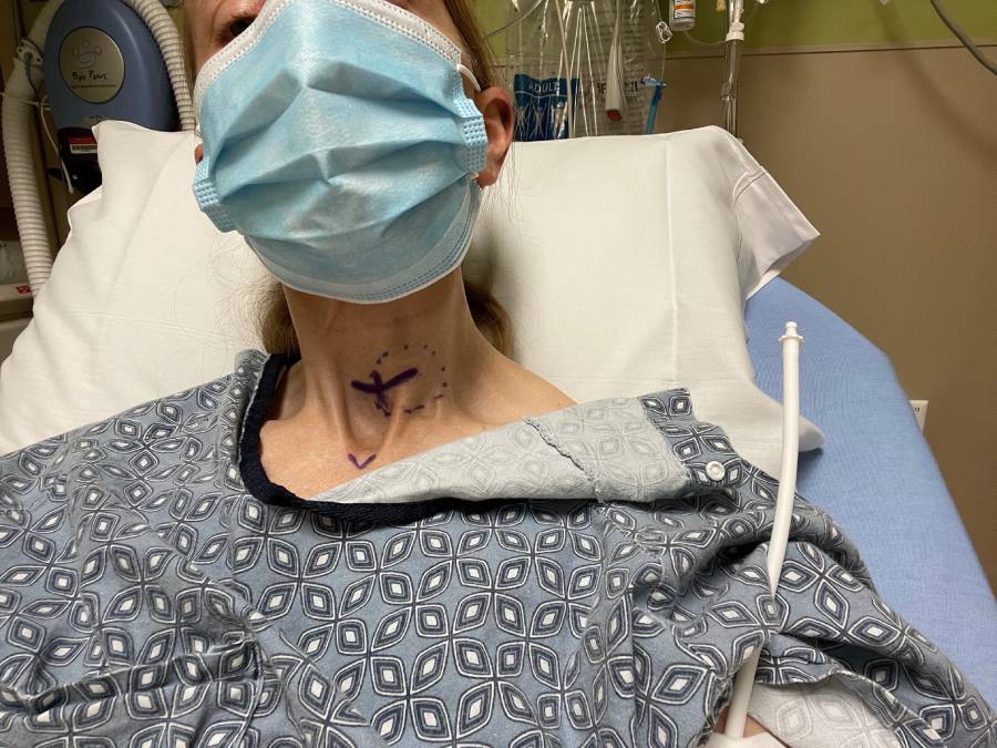 In the hospital the day of my first thyroid surgery with the markings on my neck of where they needed to cut me open. 