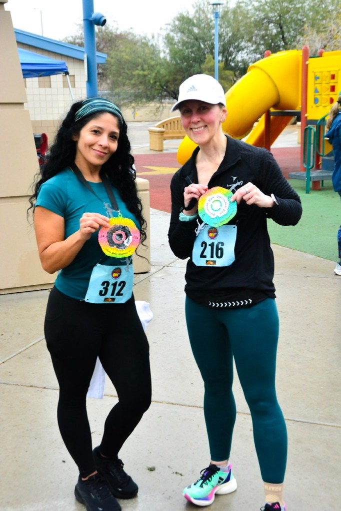 Me with a new friend after the Revolution Run 5K on 01/01/2026