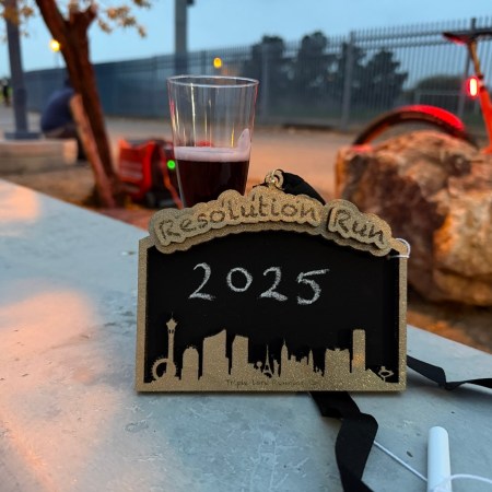 Medal and glass of fake champagne from the 2025 resolution run 5k